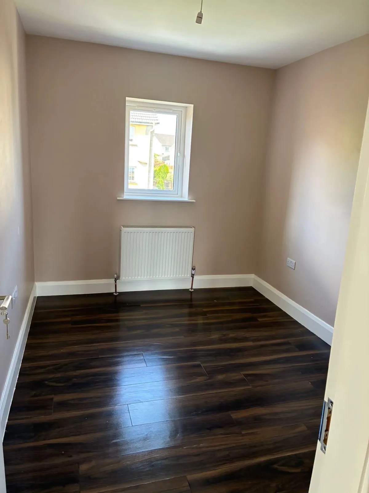 The bedroom after cleaning with a clear polished floor