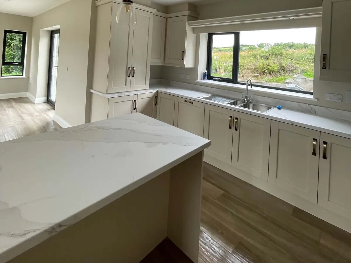 A finished Cullens Cleaning kitchen project with clear worktops and a polished floor